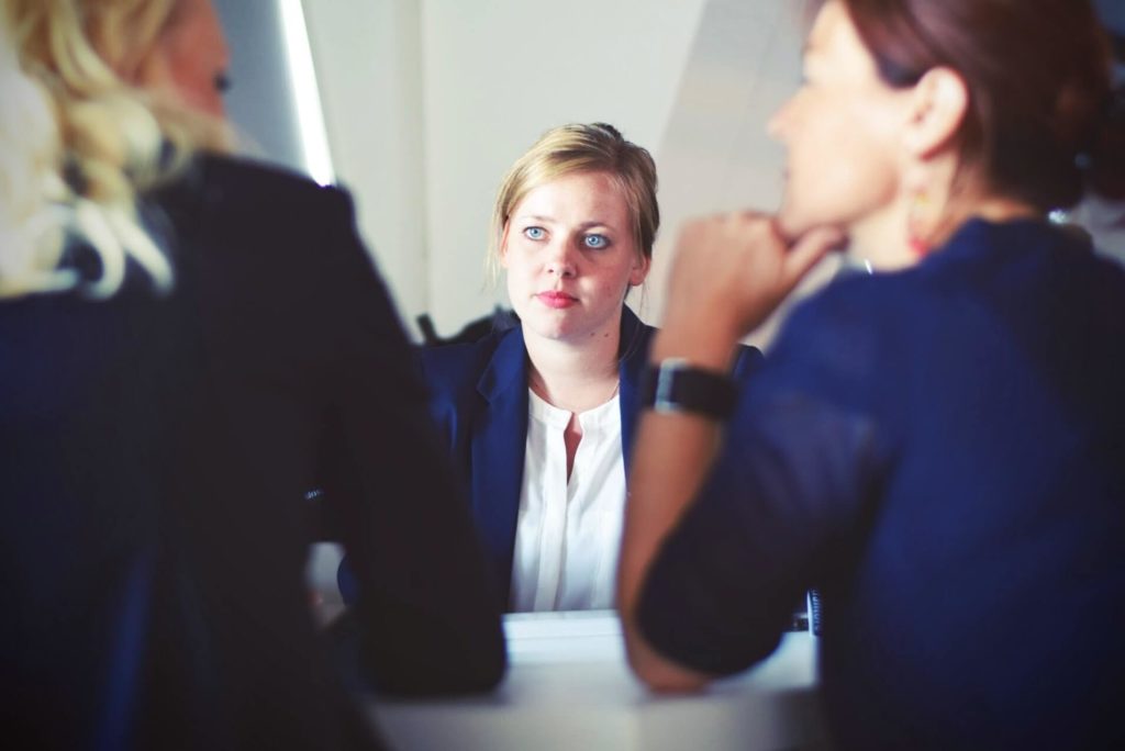 Three business woman sitting in a conference