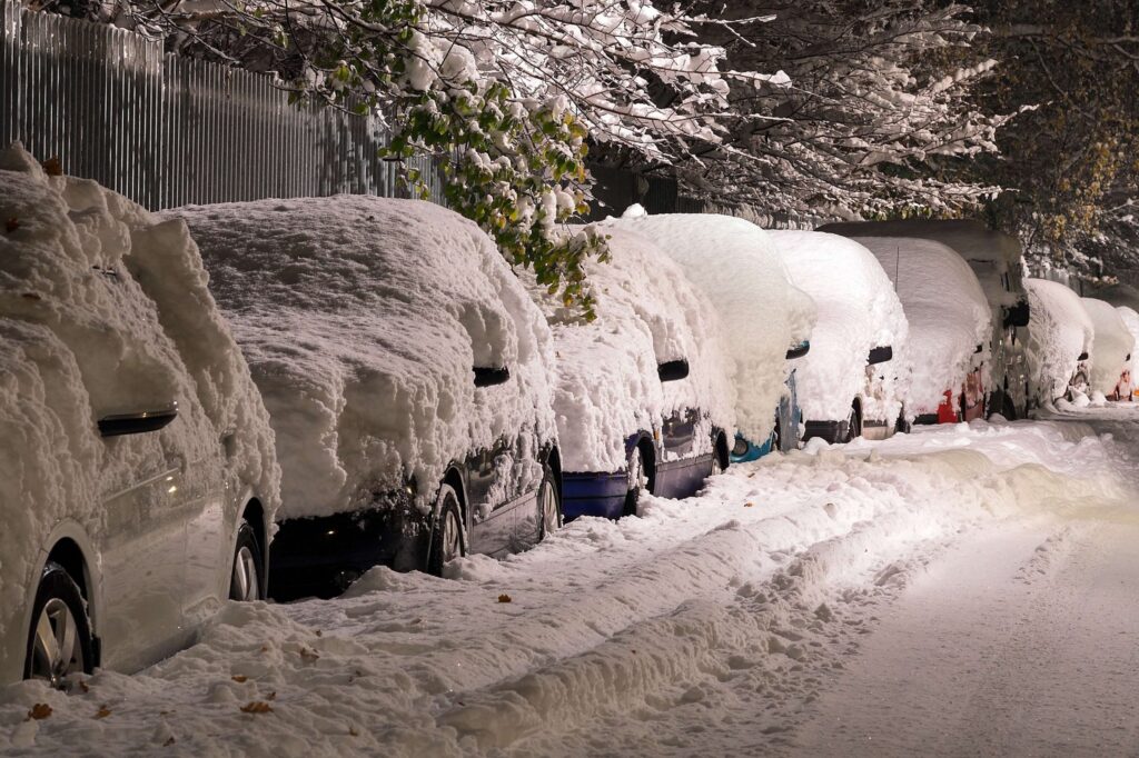 Cars parked during a blizzard